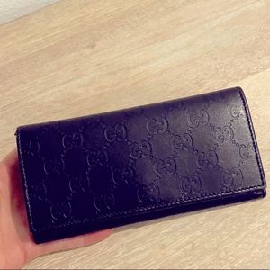 Gucci leather trifold wallet